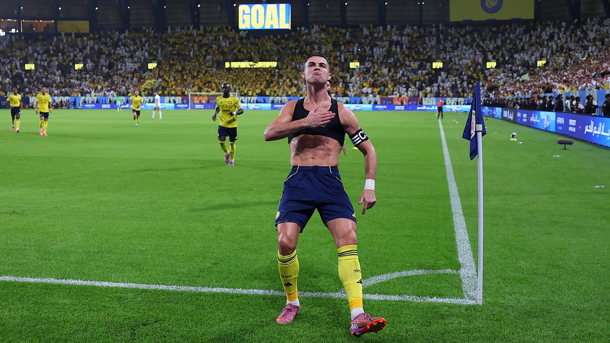 | Photo: X/AlNassrFC_EN : Al-Nassr's Cristiano Ronaldo celebrates his goal against Al Fateh in a Saudi Pro League 2025-26 match at Al-Awwal Park on October 18, 2025.