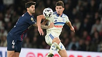 | Photo: AP/Christophe Ena : PSG's Lucas Beraldo, left, and Strasbourg's Joaquin Panichelli challenge for the ball during the French League One soccer match between Paris Saint-Germain and Strasbourg, in Paris, France, Friday, Oct. 17, 2025. 