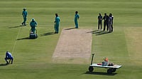 AP : Ground staff prepare pitch for second Test between Pakistan and South Africa, at the Rawalpindi Cricket Stadium.