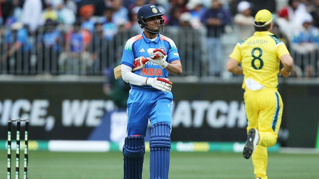 David Woodley/AAPImage via AP : Shubman Gill walks off after being dismissed by Nathan Ellis during the one-day international cricket match between Australia and India in Perth.