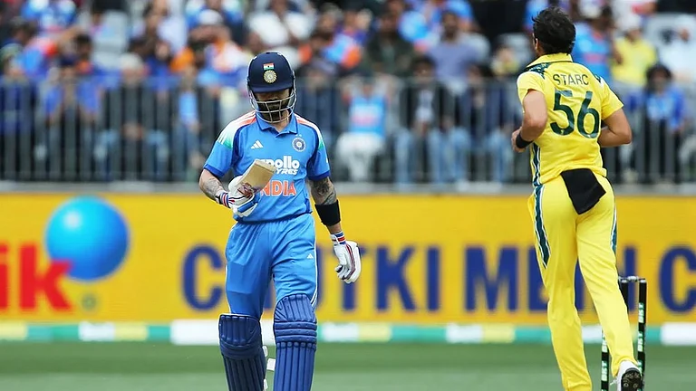India Vs Australia 1st ODI: Virat Kohli walks back after being dismissed for zero. - | Photo: David Woodley/AAPImage via AP
