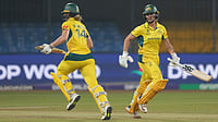 | Photo: AP/Rafiq Maqbool : Australia's Ashleigh Gardner , right, and Australia's Annabel Sutherland run between the wickets during the ICC Women's Cricket World Cup cricket match between England and Australia at Holkar Cricket Stadium in Indore, India, Wednesday, Oct. 22, 2025.
