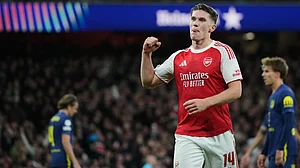 AP/Alastair Grant : Viktor Gyoekeres celebrates after scoring his side's third goal during the Champions League opening phase soccer match between Arsenal and Atletico Madrid.