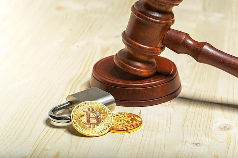 Gavel, padlock, and Bitcoin symbolizing crypto regulation