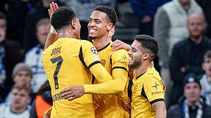 | Photo: AP/Liselotte Sabroe : Borussia Dortmund's Felix Nmecha, center, celebrates scoring during the Champions League opening phase soccer match between FC Copenhagen and Borussia Dortmund at Parken in Copenhagen on Tuesday, Oct. 21, 2025.