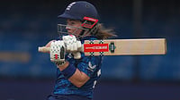 | Photo: AP/Rafiq Maqbool : England's Tammy Beaumont during the ICC Women's Cricket World Cup cricket match between England and Australia at Holkar Cricket Stadium in Indore, India, Wednesday, Oct. 22, 2025. 