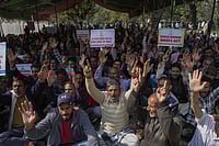 Credits- IMAGO / NurPhoto : Jammu And Kashmir Employees Joint Action Committee Held A Convention In Srinagar Daily wagers and casual laborers from various government departments shout slogans during a convention demanding the regularization of their services and a salary hike in Srinagar, Jammu and Kashmir, on October 16, 2025.