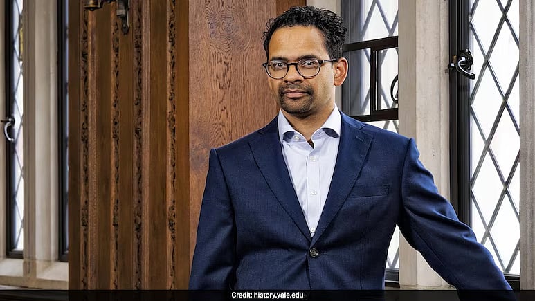 X.com : 
Born in Kenya to South Indian parents, Amrith grew up in Singapore and graduated from the University of Cambridge. 