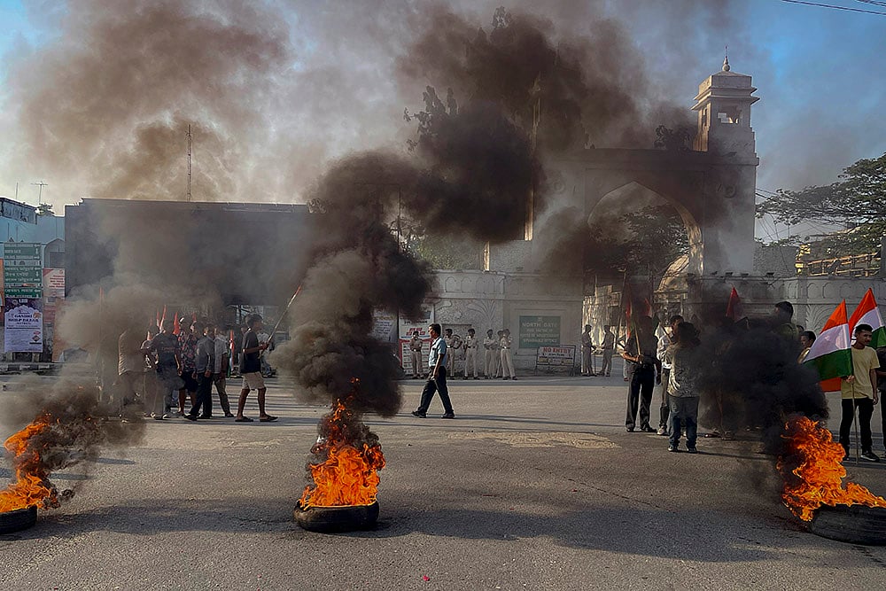 | Photo: PTI : Protest in Agartala