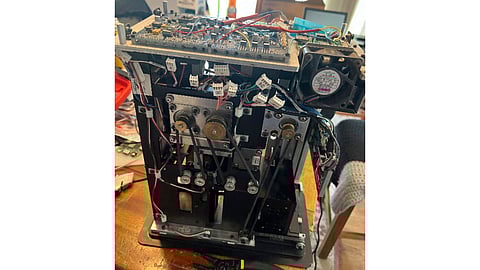 This undated image provided the U.S. Attorney's Office Eastern District of New York, shows a card shuffler allegedly used by defendants in a sports betting and illegal gambling case brought by the U.S. attorney's office of the Eastern District of New York, Thursday, Oct. 23, 2025, in New York. 
