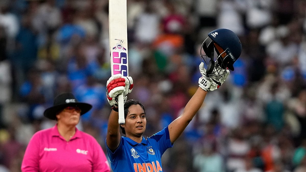 (AP Photo/Rajanish Kakade) : India's Pratika Rawal celebrates her century during the ICC Women's Cricket World Cup cricket match between India and New Zealand at DY Patil Stadium in Navi Mumbai, India, Thursday, Oct. 23, 2025.