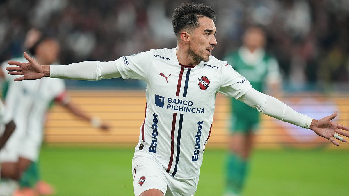 | Photo: AP/Dolores Ochoa : Lisandro Alzugaray of Ecuador's Liga Deportiva Universitaria celebrates scoring his side's second goal, from the penalty spot, against Brazil's Palmeiras during a Copa Libertadores semifinal first leg soccer match in Quito, Ecuador, Thursday, Oct. 23, 2025