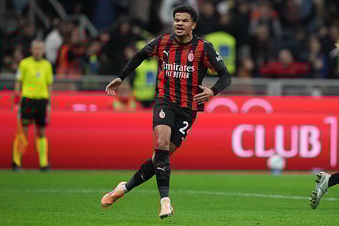AC Milan's Zachary Athekame celebrates after scoring during the Serie A soccer match between AC Milan and Pisa in Milan, Italy.