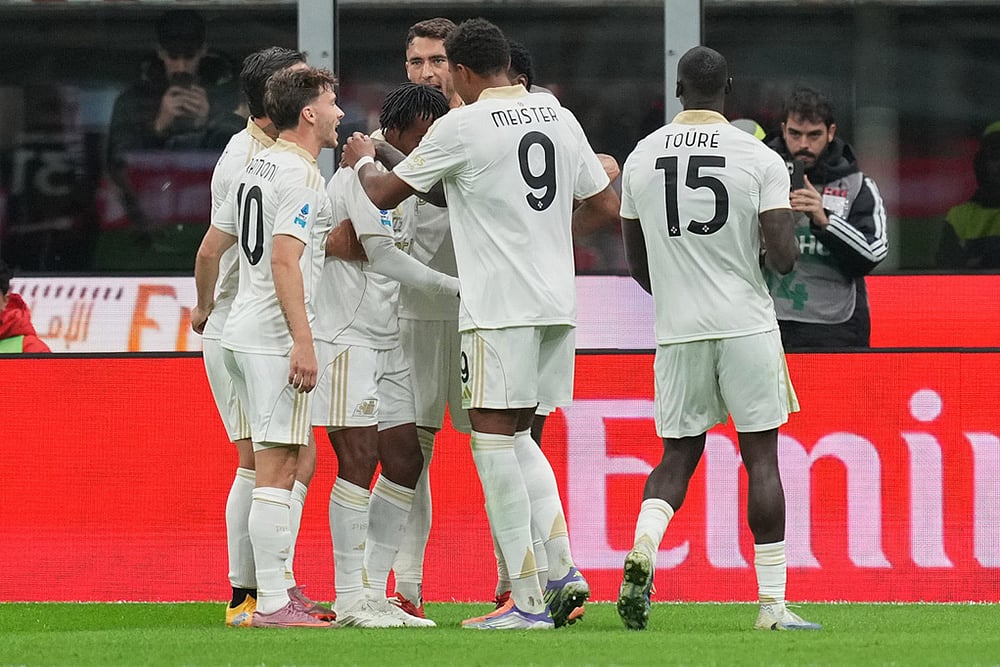 Italy Serie A soccer 2025-26 AC Milan and Pisa football match_Pisa players celebrate goal