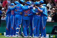 | Photo: AP/Rick Rycroft : Indian players huddle before taking the field against Australia during their One Day International cricket match in Sydney, Australia.