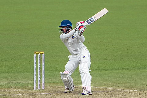 Bengal's Sudip Kumar Gharami plays a shot during the first day of the Ranji Trophy cricket match between Bengal and Gujarat, at Eden Gardens, in Kolkata, West Bengal.