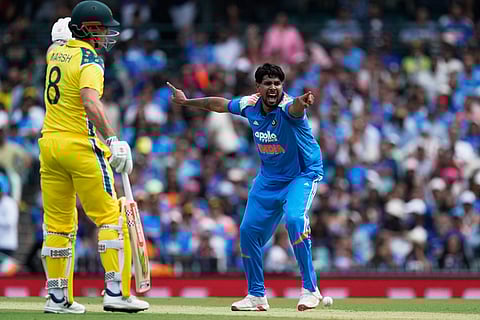 India's Harshit Rana, right, appeals for a LBW decision against Australia during their One Day International cricket match in Sydney, Australia.