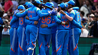 Photo: AP : IND Vs AUS LIVE Cricket Score, 3rd ODI: Indian players huddle before taking the field against Australia in Sydney.