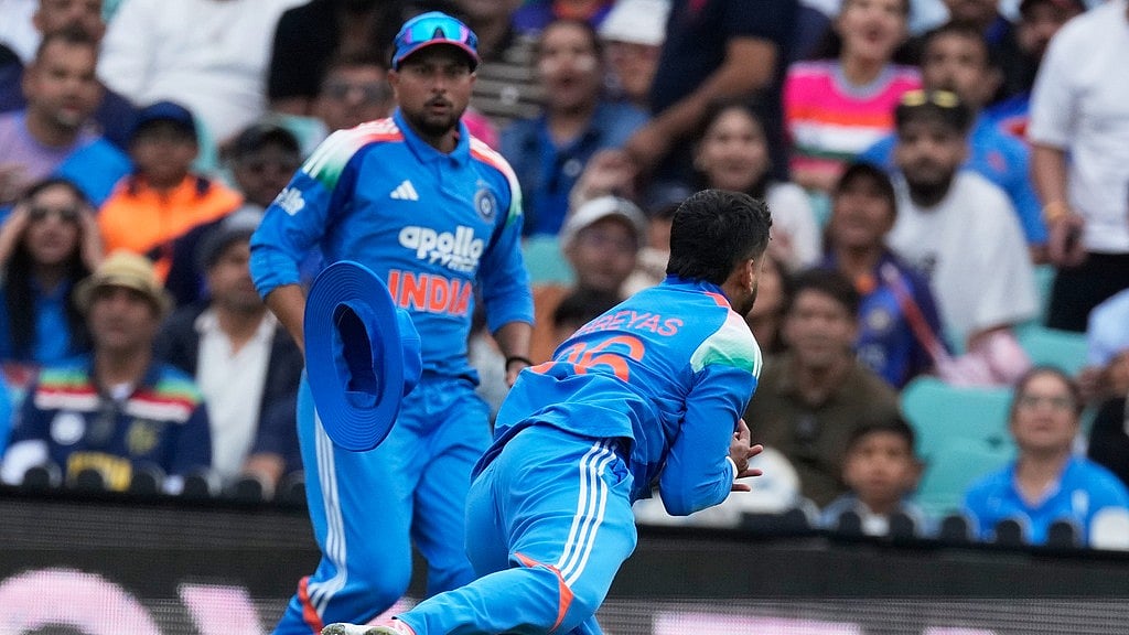 AP : India's Shreyas Iyer, right, catches out Australia's Alex Carey during the third one-day international in Sydney.