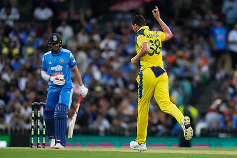 Australia's Josh Hazlewood, right, celebrates taking the wicket of India's Shubman Gill, left, during their One Day International cricket match in Sydney, Australia.