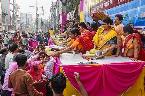 Volunteers distribute Chhath Puja essentials on the occasion of ‘Nahay Khay’, the first day of the four-day Chhath festival, in Patna.