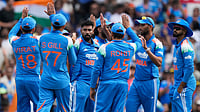 Photo: AP : IND Vs AUS Live Cricket Score, 3rd ODI: India's Mohammed Siraj, centre, celebrates with teammates taking the wicket of Australia's Travis Head in Sydney.