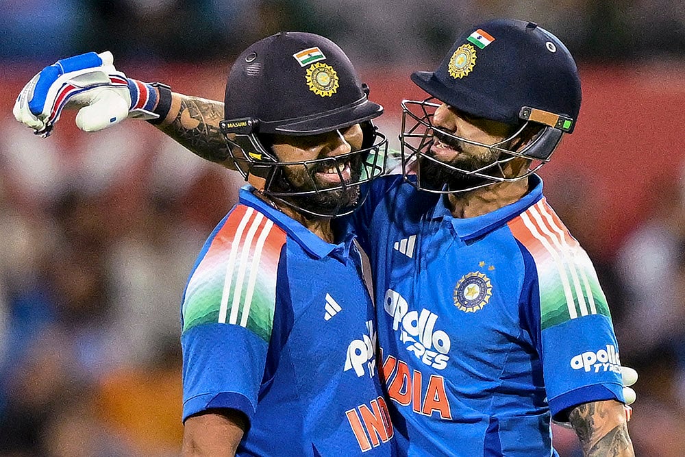 | Photo: PTI/Izhar Khan : India's Rohit Sharma, left, celebrates his century with teammate Virat Kohli during the third One-Day International (ODI) cricket match between India and Australia, at the Sydney Cricket Ground, in Sydney, Australia.
