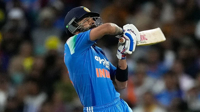 India Vs Australia LIVE Cricket Score, 3rd ODI: Virat Kohli plays a hook shot in Sydney. - Photo: AP