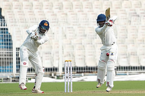 Bengal's Sudip Kumar Gharami plays a shot during the first day of the Ranji Trophy cricket match between Bengal and Gujarat, at Eden Gardens, in Kolkata, West Bengal.