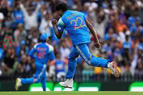 India's Harshit Rana celebrates after taking the wicket of Australia's Mitch Owen during their One Day International cricket match in Sydney, Australia.