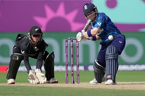 England's Tammy Beaumont plays a shot during the ICC Women's Cricket World Cup match between England and New Zealand at ACA–VDCA Cricket Stadium in Visakhapatnam.