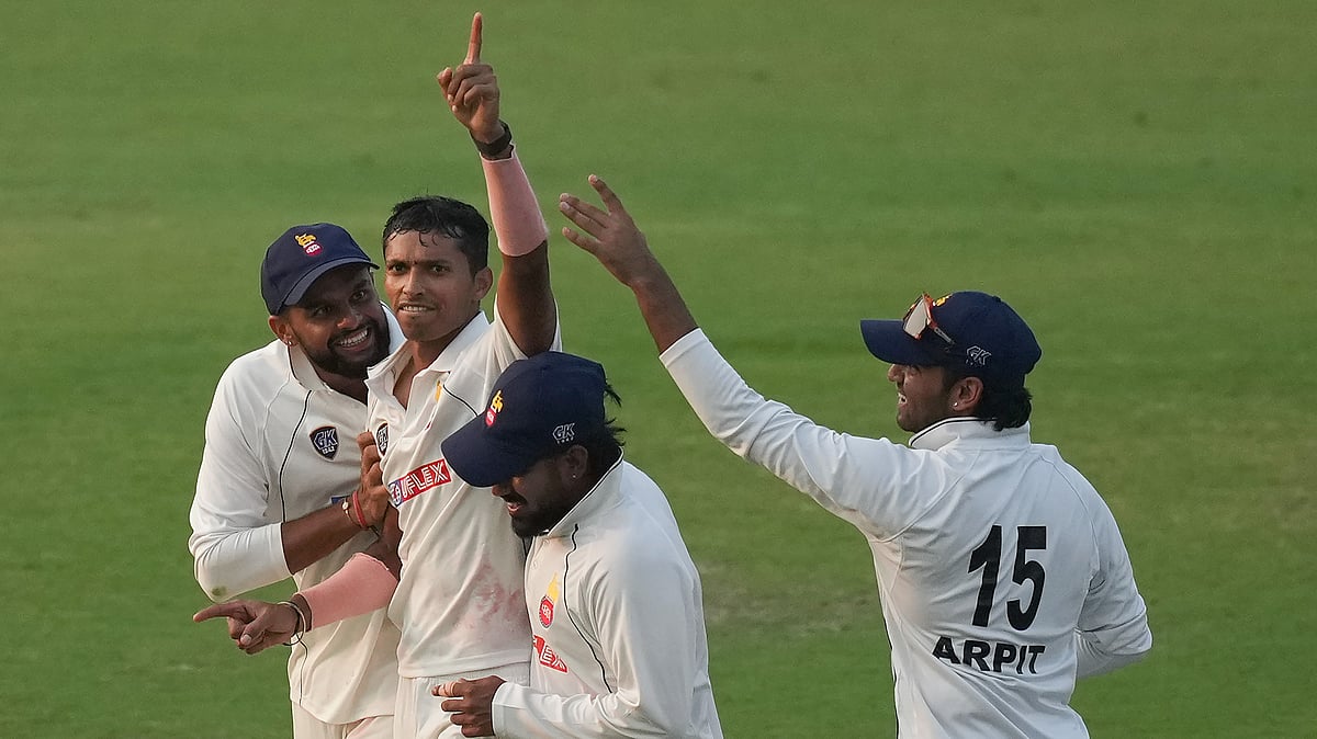PTI : Navdeep Saini celebrates with teammates after taking the wicket of Sidhant Purohit on day two of the Ranji Trophy match between Delhi and Himachal Pradesh, at Arun Jaitley Stadium.
