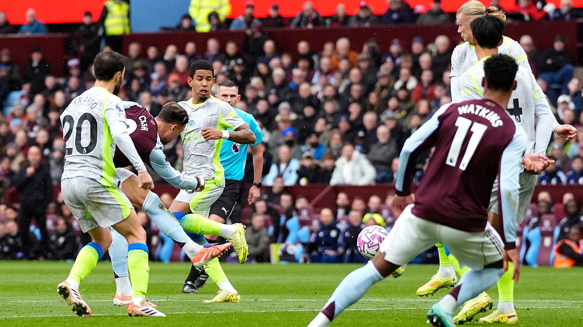 AP/Nick Potts : Aston Villa's Matty Cash (second left) scores his side's first goal during the English Premier League match between Aston Villa and Manchester City, in Birmingham.