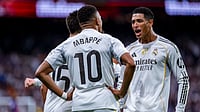 Jude Bellingham and Kylian Mbappe celebrate