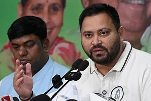 | Photo: PTI : RJD Leader of Opposition Tejashwi Yadav addresses a press conference at his official residence, in Patna.