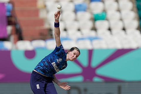 England's Lauren Bell bowls a delivery during the ICC Women's Cricket World Cup match between England and New Zealand at ACA–VDCA Cricket Stadium in Visakhapatnam.
