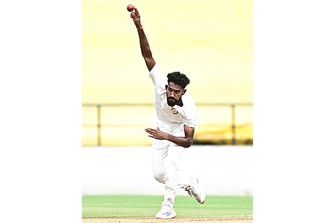 Vidarbha's Praful Hinge bowls on the second day of the Ranji Trophy match between Vidarbha and Jharkhand at VCA Stadium, in Nagpur, Maharashtra.
