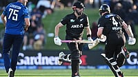 | Photo: AP/Andrew Cornaga                                           : New Zealand's Daryl Mitchell, centre, and Michael Bracewell run between the wickets during the One Day international cricket match between New Zealand and England in Mt Maunganui, New Zealand, Sunday, Oct.26, 2025. 