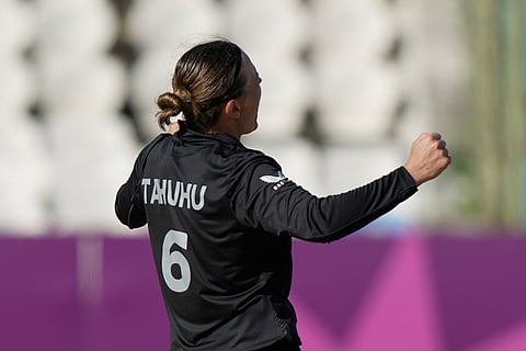 New Zealand's Lea Tahuhu celebrates the wicket of England's Tammy Beaumont during the ICC Women's Cricket World Cup match between England and New Zealand at ACA–VDCA Cricket Stadium in Visakhapatnam.