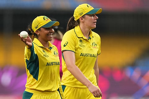 Australia's Alana King, left, celebrate her seven wicket during the ICC Women's Cricket World Cup match between Australia and South Africa in Indore.