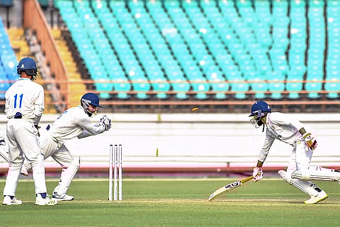 Saurashtra’s Ravindra Jadeja being stumped by Madhya Pradesh’s wicketkeeper Himanshu Mantri on day one of a Ranji Trophy cricket match between Saurashtra and Madhya Pradesh, at Niranjan Shah Stadium, in Rajkot.