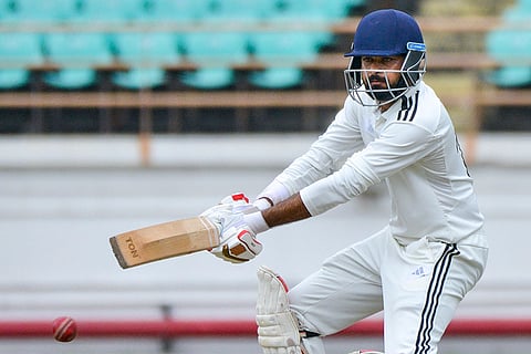 Madhya Pradesh's Saransh Jain plays a shot during the third day of the Ranji Trophy 2025-26 cricket match between Saurashtra and Madhya Pradesh, in Rajkot, Gujarat.