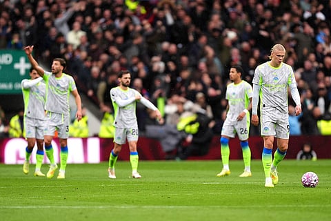 Manchester City's Erling Haaland (right) and team-mates react after Aston Villa scored their side's first goal during the English Premier League match between Aston Villa and Manchester City, in Birmingham, England.