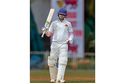 Mumbai’s Akash Anand celebrates his half century on day two of a Ranji Trophy cricket match between Mumbai and Chhattisgarh, at Sharad Pawar Cricket Academy BKC, in Mumbai.