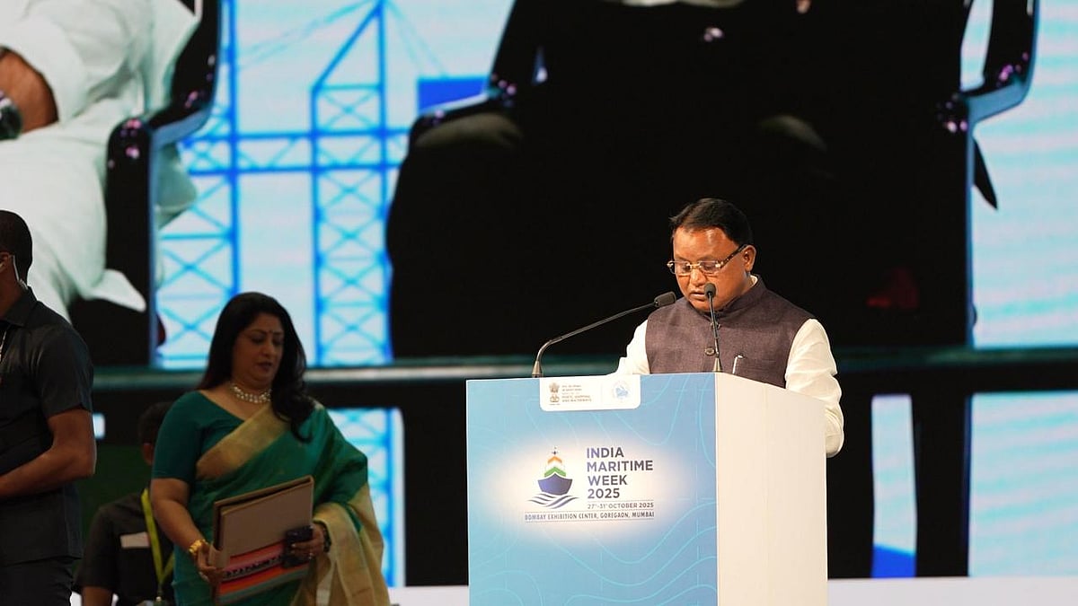 CM Mohan Charan Majhi speaking at podium