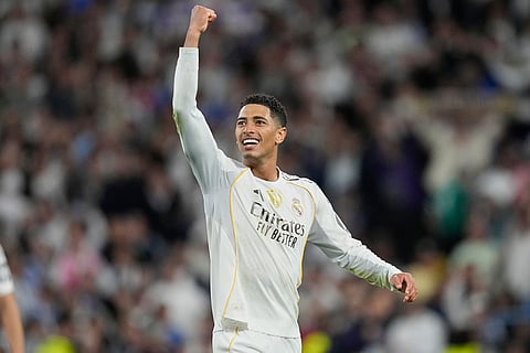 Real Madrid's Jude Bellingham reacts after a La Liga soccer match between Real Madrid and Barcelona in Madrid, Spain.