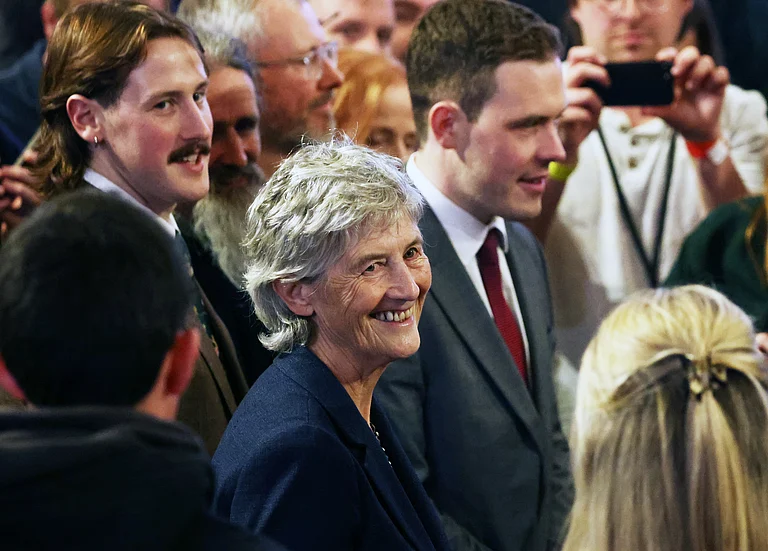 Catherine Connolly smiles to supporters after being elected as the new President of Ireland at Dublin Castle, Ireland, Saturday, Oct. 25, 2025. - (AP Photo/Peter Morrison)