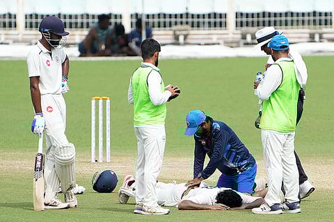 Gujarat's Urvil Patel takes massage during a break on the fourth day of the Ranji Trophy 2025-26 cricket match between Bengal and Gujarat, at Eden Gardens, in Kolkata.