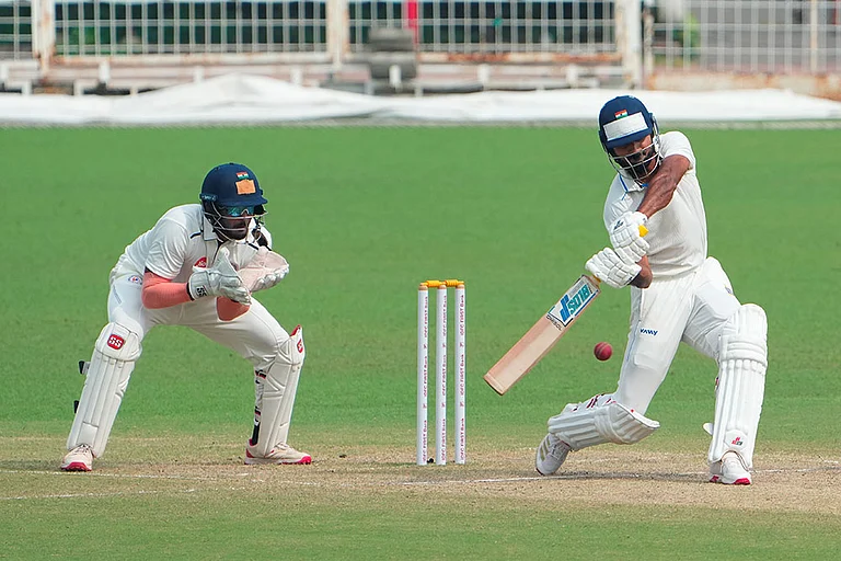 Bengal's Akash Deep plays a shot during the fourth day of the Ranji Trophy 2025-26 cricket match between Bengal and Gujarat, at Eden Gardens, in Kolkata. - Photo: PTI/Swapan Mahapatra