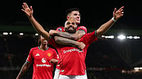 Manchester United forward Bryan Mbeumo celebrates his goal against Brighton